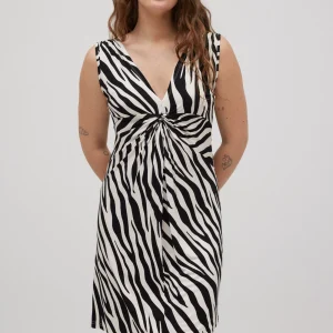 Abito corto animalier con nodo frontale