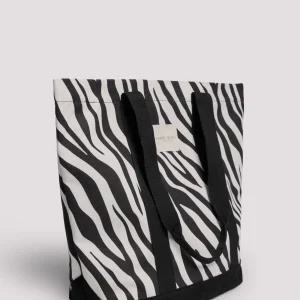 Borsa da mare in tessuto animalier con manico nero